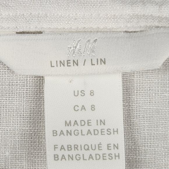 H&M 100% Linen Peplum Wrap Blouse Women’s SZ 8 White Tie Pearl Buttons EUC - Picture 12 of 14